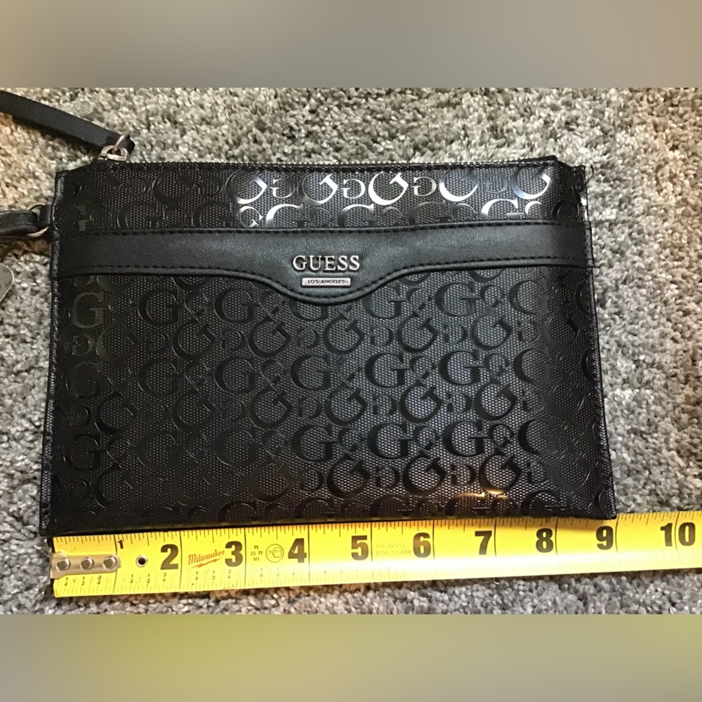 NWT GUESS Embossed Black pocket Bag